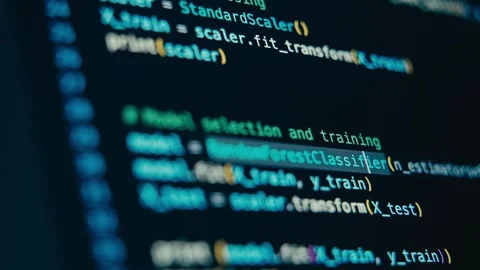 Programming Code Appearing on a Dark Computer Monitor Screen at Work Stock Footage 331164916