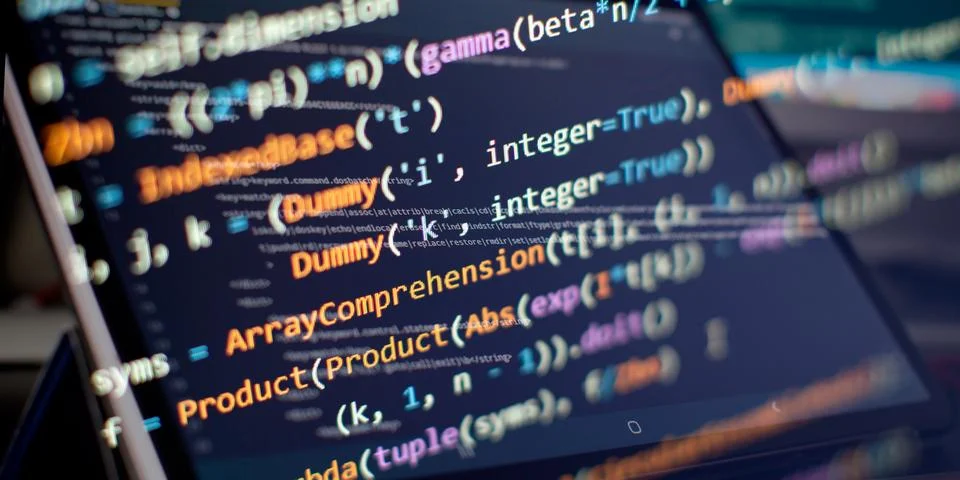 Programming code background . Software developer programming code. Stock Photos