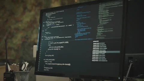 Programming Code on Computer Display in Military Control Center Stock Footage 262724390