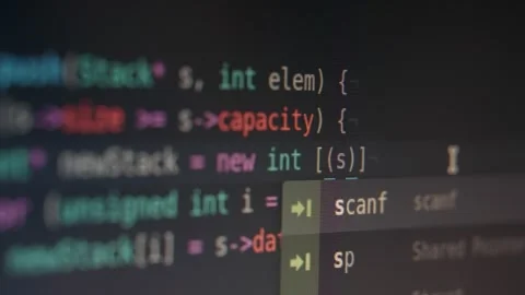 Programming Code Editing on a Computer Screen in a Dark Software Office Video stock 331164621