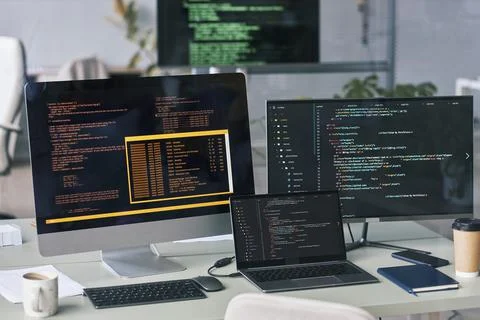 Programming Code on Monitors 写真素材