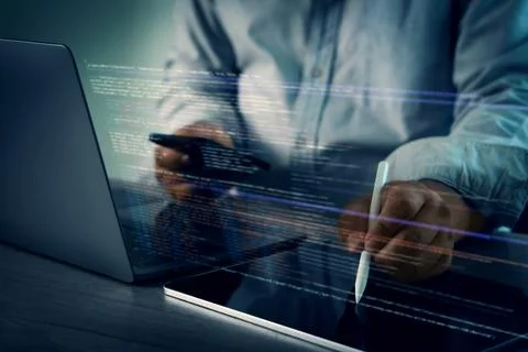 Programming code on representing person working laptop with digital code an.. Stock Photos