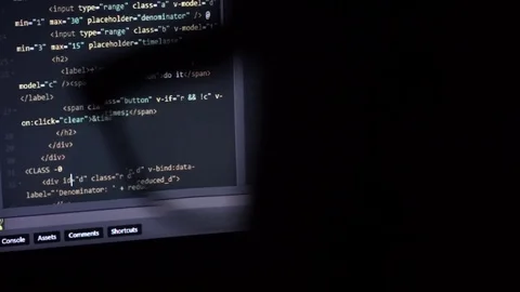 Programming code running down through glasses Stock Footage 73456272