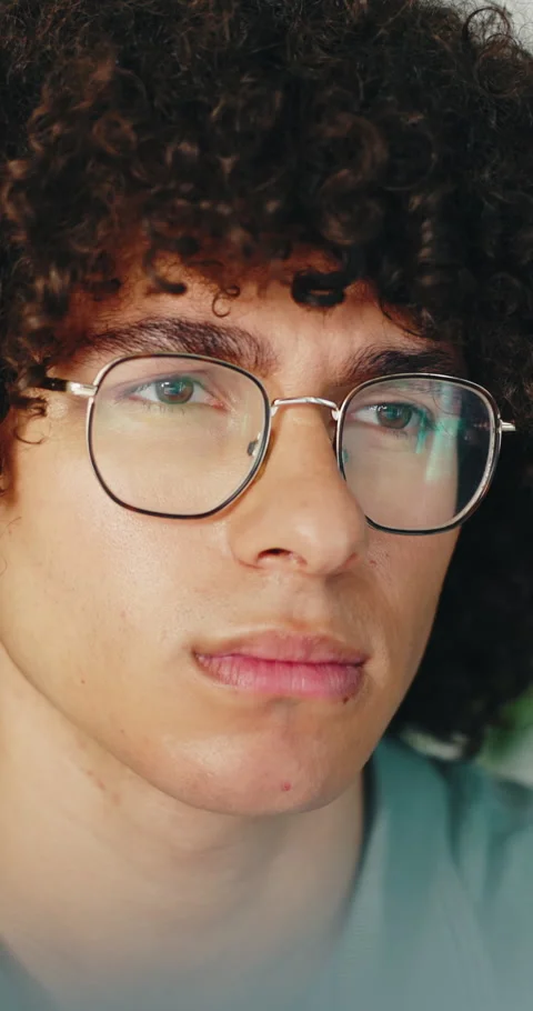 Programming, computer and man with glasses in office, thinking and planning for Stock Footage 336774349