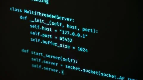 Programming computer code on screen in software development process. 库存照片