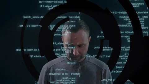 Programming data, code, text, script on the screen in front of the man. Stock Footage 106301713