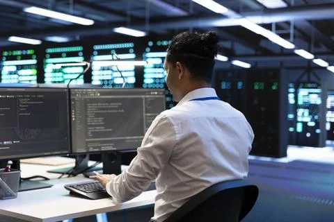 Programming, developer and coding at data center workstation 写真素材