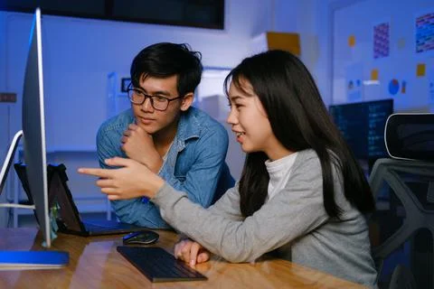 Programming development technology work at night. Stock Photos