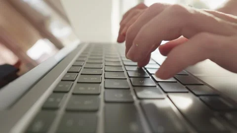 Programming of the future: A programmer types code and develops a program using Stock Footage 257679528