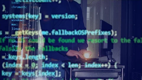 Programming information is turning up along the image of the IT worker Stock Footage 114738704