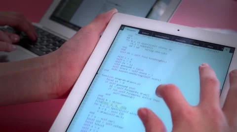 Programming on an iPad Video stock 40686806