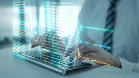 Programming language hologram with coder hands typing on computer keyboard Stock Footage 252275173