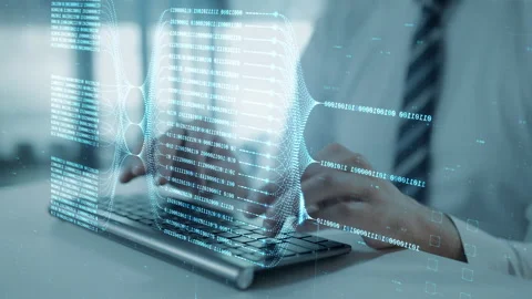 Programming language hologram with coder hands typing on computer keyboard Stock Footage 254332039