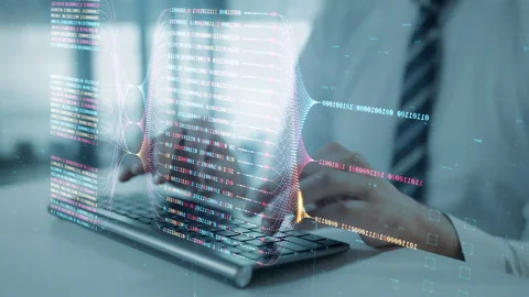 Programming language hologram with coder hands typing on computer keyboard Stock Footage 260826091
