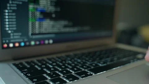 Programming Laptop Screen Showing Software Development Code and Typing Stock Footage 331164606
