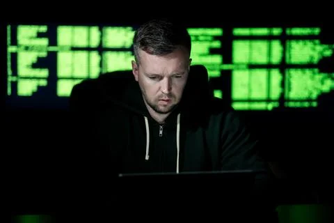 Programming on laptop shows night work. Programming on code screen builds Stock Photos