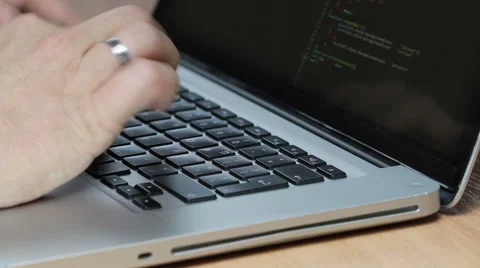 Programming on a MacBook Stock Footage 63433444