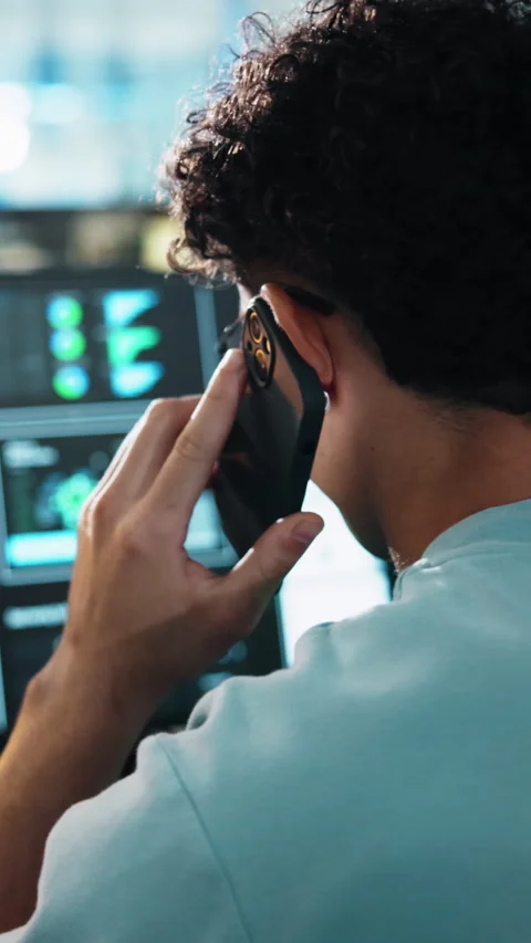 Programming, man or computer with phone call in office for code review, system 스톡 동영상 333235788