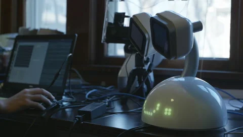 Programming a Robot Stock Footage 147359302