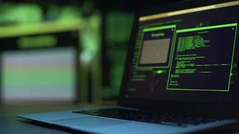 Programming scripts running on laptop monitor, server hacking process, crime Stock Footage 84109673