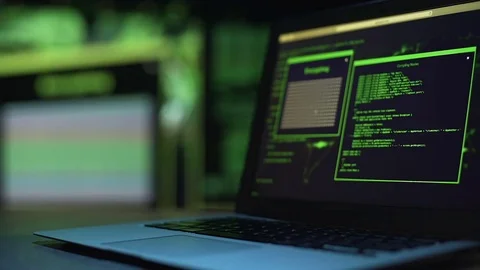 Programming scripts running on laptop monitor, server hacking process, crime Stock Footage 84116197