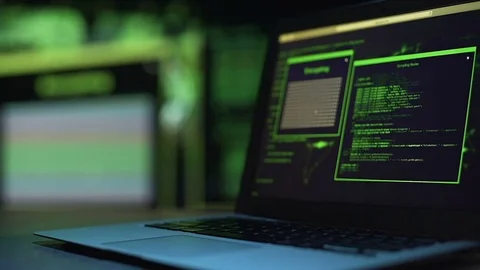 Programming scripts running on laptop monitor, server hacking process, crime Stock Footage 84117569