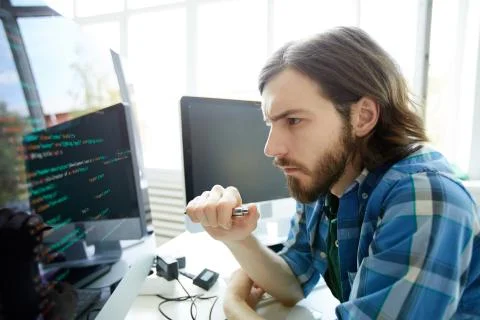 Programming specialist Stockfoto's