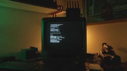 Programming text displayed on computer display inside dimmed room. Stock Footage 310924405