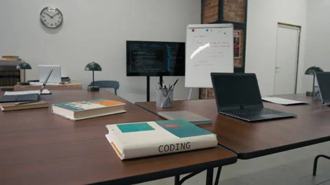 Programming Textbooks and Laptops on Desks in Prison Classroom Stock Footage 314054294
