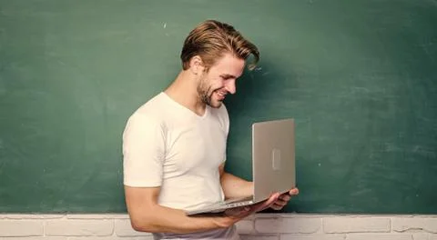 Programming web development. School teacher programming with laptop. Student Stock Photos