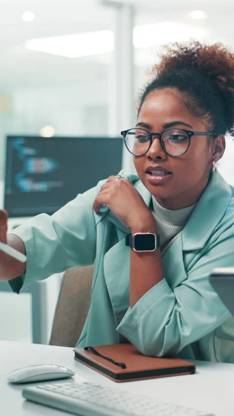 Programming, woman and teamwork with tablet, developer and stylus for debugging Stock Footage 306824771