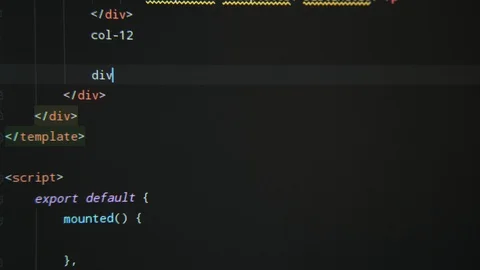 The programming work depicted on a wide black pc screen with many symbols Stock Footage 121870357