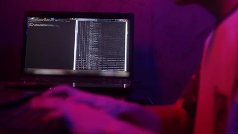 Programming. Young guy programmer working. Working on keyboard Stock Footage 124360770