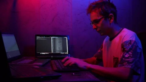 Programming. Young guy programmer working.Guy in glasses working on computer Stock Footage 124360763