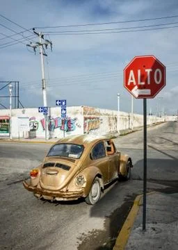 Progreso, Mexico - October 14th, 2007: Old rusty Volkswagen Beetle, tail ligh Stock Photos