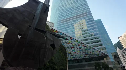 Progress and Advancement Monument with CBD Skyscrapers in Singapore Stock Footage 310994530