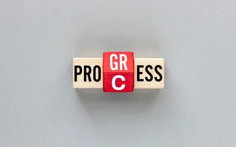 PROGRESS and PROCESS concept. letters on wooden blocks changes the word  Stock Photos