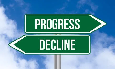 Progress or decline road sign on cloudy sky background Stock Photos