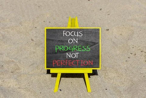 Progress or perfection words symbol. Concept words Focus on progress not pe.. Stockfoto's