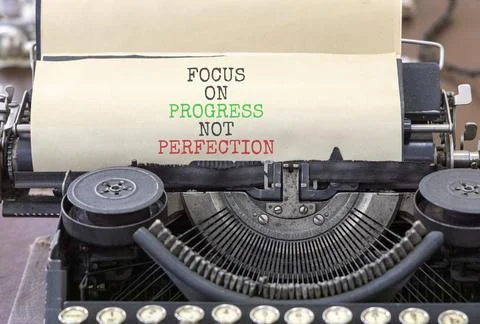Progress or perfection words symbol. Concept words Focus on progress not pe.. Stockfoto's