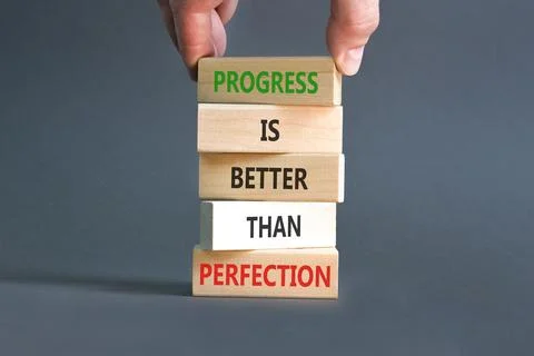 Progress or perfection words symbol. Concept words Progress is better than .. Stockfoto's
