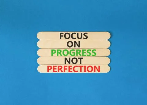 Progress or perfection words symbol. Concept words Focus on progress not pe.. Stockfoto's