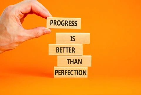 Progress or perfection words symbol. Concept words Progress is better than .. Stockfoto's