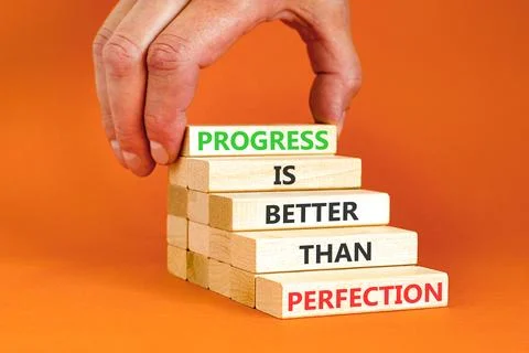 Progress or perfection words symbol. Concept words Progress is better than .. Stockfoto's