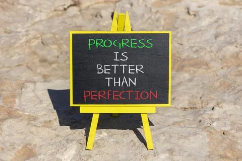 Progress or perfection words symbol. Concept words Progress is better than pe Stockfoto's
