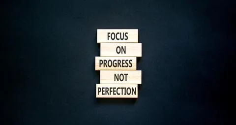 Progress or perfection words symbol. Concept words Focus on progress not pe.. Stock Photos