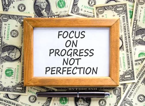 Progress or perfection words symbol. Concept words Focus on progress not pe.. Stock Photos