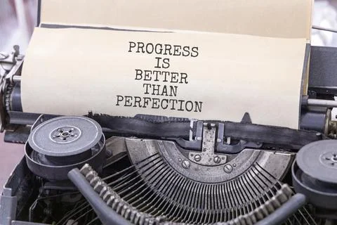 Progress or perfection words symbol. Concept words Progress is better than .. Stock Photos