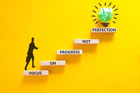 Progress or perfection words symbol. Concept words Focus on progress not pe.. Stock Photos