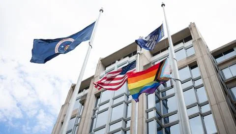 The Progress Pride flag is seen flying at the Mary W. Jackson NASA Stock Photos